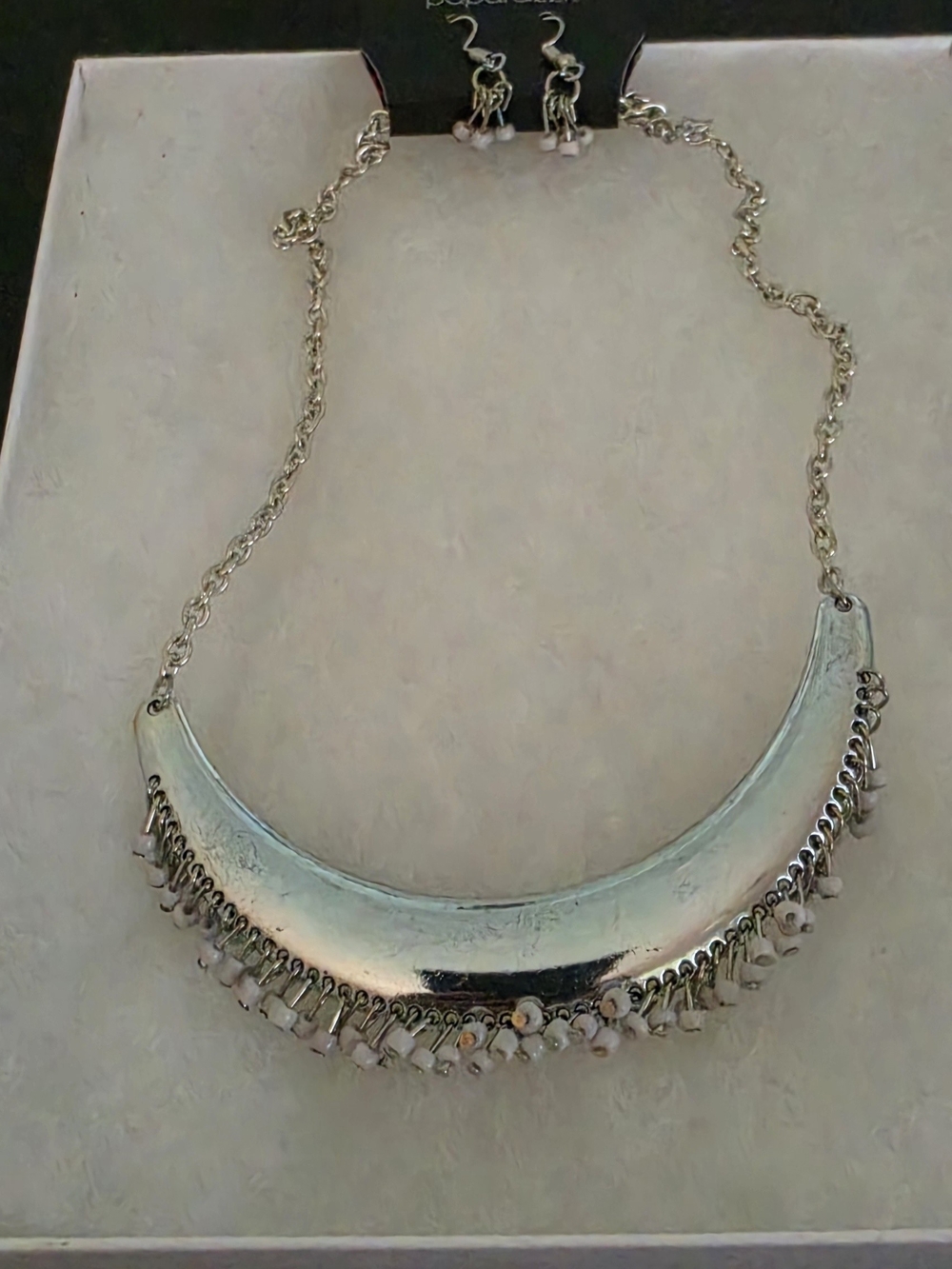 Silver Crescent Statement Necklace with White Bead Fringe and earrings.